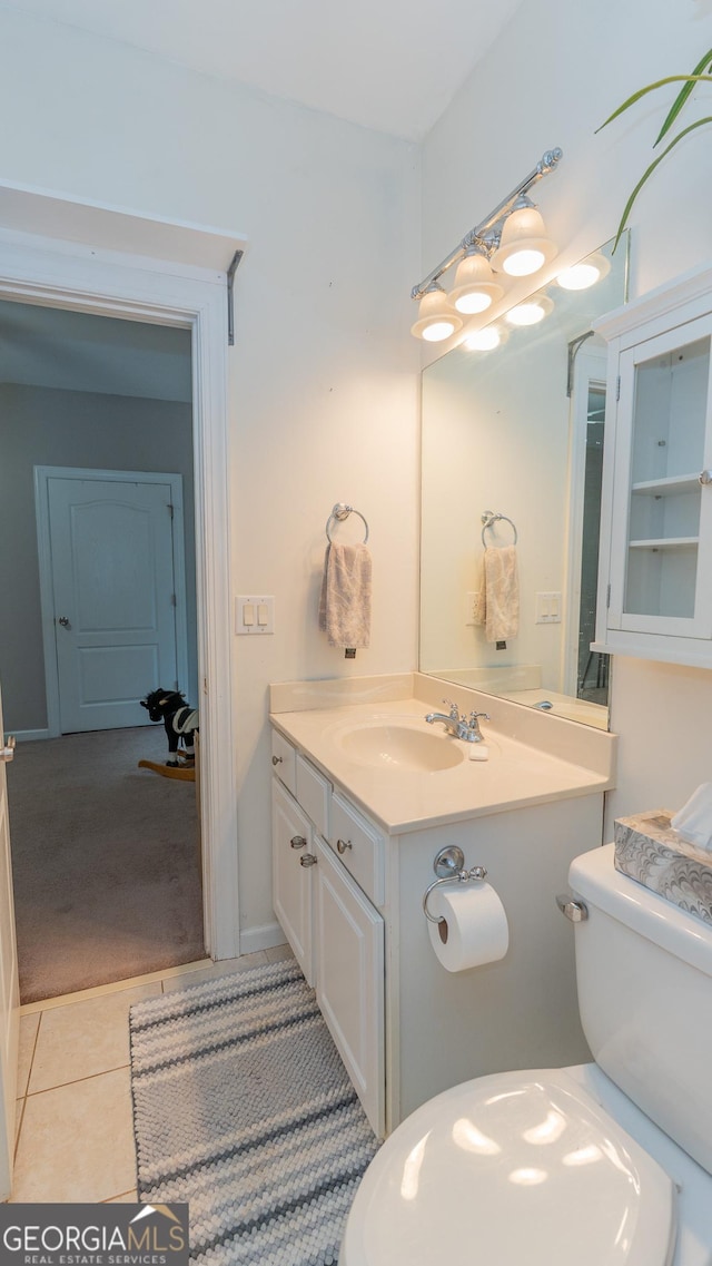 219 Periwinkle Way, Pendergrass, GA 30567 - bathroom with toilet, vanity, and tile patterned floors