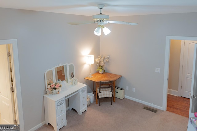219 Periwinkle Way, Pendergrass, GA 30567 - office area featuring a ceiling fan, light colored carpet, a baseboard radiator, and baseboards