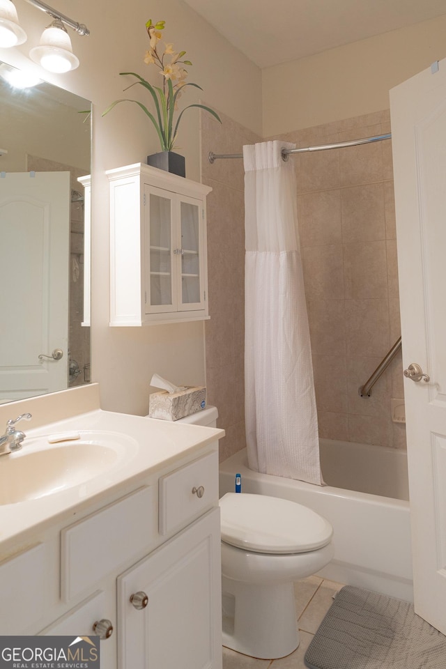219 Periwinkle Way, Pendergrass, GA 30567 - bathroom featuring vanity, shower / tub combo with curtain, toilet, and tile patterned flooring