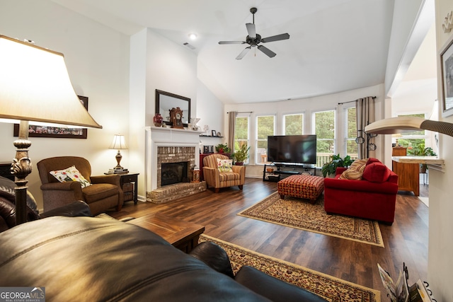 2059 Ivey Chase Dr, Dacula, GA 30019 - living room featuring a fireplace, wood finished floors, a ceiling fan, high vaulted ceiling, and recessed lighting