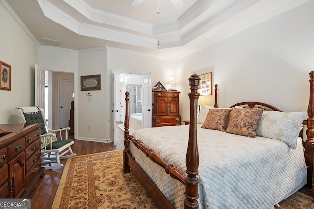 2059 Ivey Chase Dr, Dacula, GA 30019 - bedroom featuring dark wood-style floors, crown molding, a raised ceiling, baseboards, and a ceiling fan