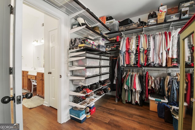 2059 Ivey Chase Dr, Dacula, GA 30019 - walk in closet featuring wood finished floors