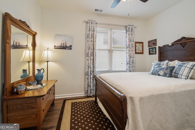 2059 Ivey Chase Dr, Dacula, GA 30019 - bedroom with dark wood finished floors, baseboards, and ceiling fan