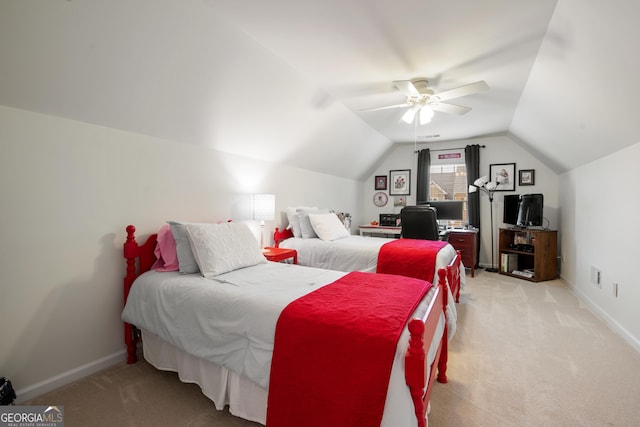 2059 Ivey Chase Dr, Dacula, GA 30019 - bedroom with light colored carpet, vaulted ceiling, a ceiling fan, and baseboards
