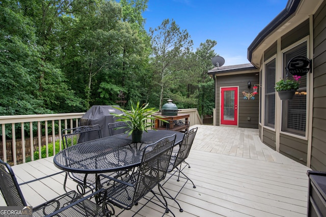 2059 Ivey Chase Dr, Dacula, GA 30019 - wooden deck with outdoor dining space and a grill