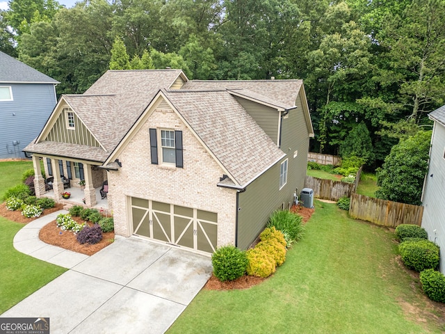 2059 Ivey Chase Dr, Dacula, GA 30019 - view of front of home featuring brick siding, a garage, driveway, and a shingled roof