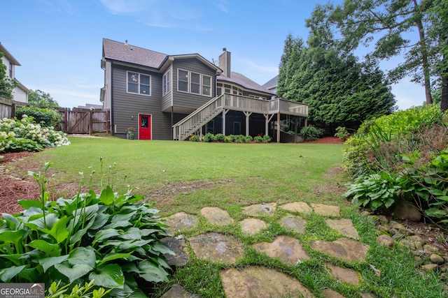 2059 Ivey Chase Dr, Dacula, GA 30019 - back of house with stairs, a deck, and a chimney