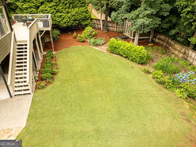 2059 Ivey Chase Dr, Dacula, GA 30019 - view of yard featuring stairs and a wooden deck