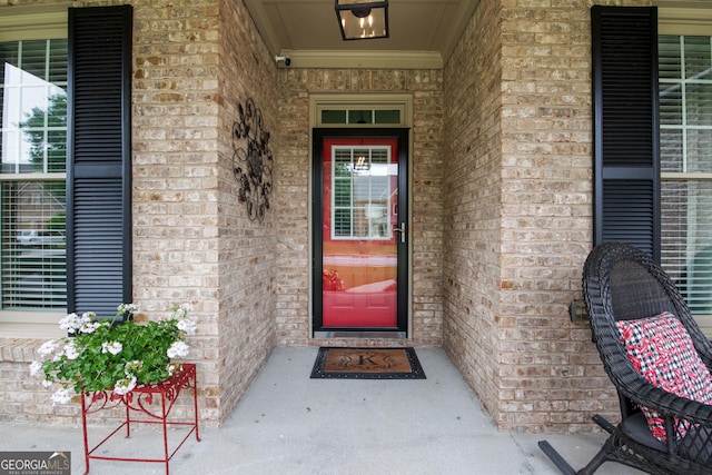 2059 Ivey Chase Dr, Dacula, GA 30019 - entrance to property featuring brick siding and a porch