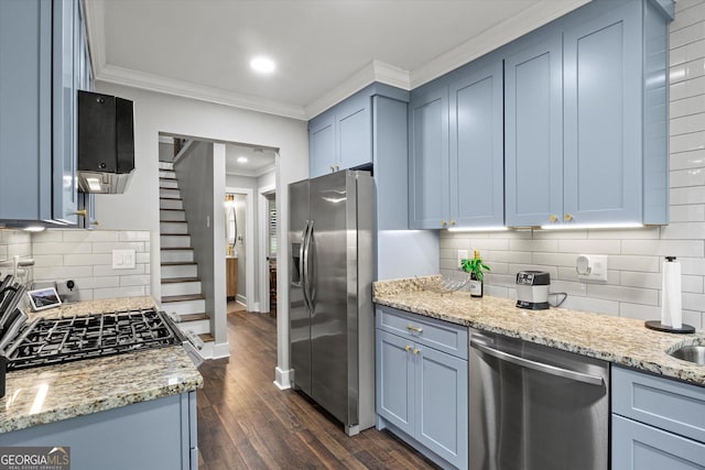 528 Allendale Dr, Decatur, GA 30032 - kitchen featuring stainless steel appliances, ornamental molding, dark wood finished floors, light stone counters, and backsplash