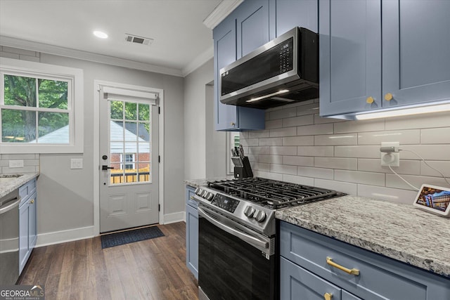 528 Allendale Dr, Decatur, GA 30032 - kitchen with appliances with stainless steel finishes, crown molding, dark wood-type flooring, blue cabinets, and baseboards