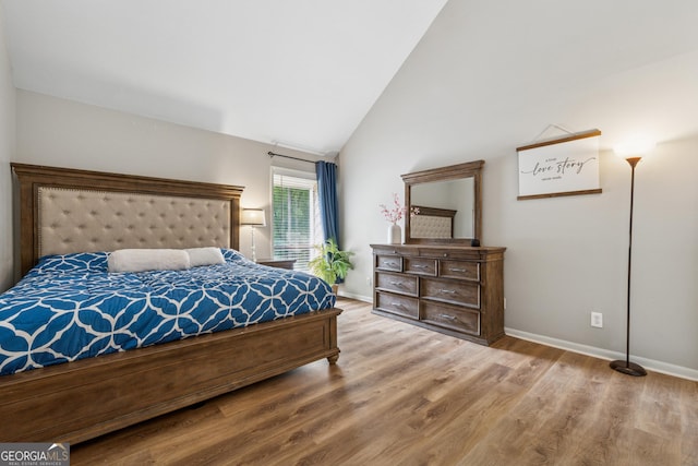 1720 Little Willeo Rd, Marietta, GA 30068 - bedroom with wood finished floors and high vaulted ceiling