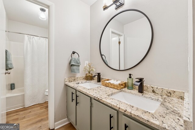 1720 Little Willeo Rd, Marietta, GA 30068 - full bath with double vanity, wood finished floors, and shower / bath combination with curtain