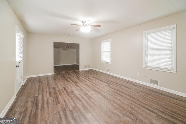 113 Lisa Ln, Carrollton, GA 30117 - spare room with a ceiling fan, wood finished floors, and baseboards