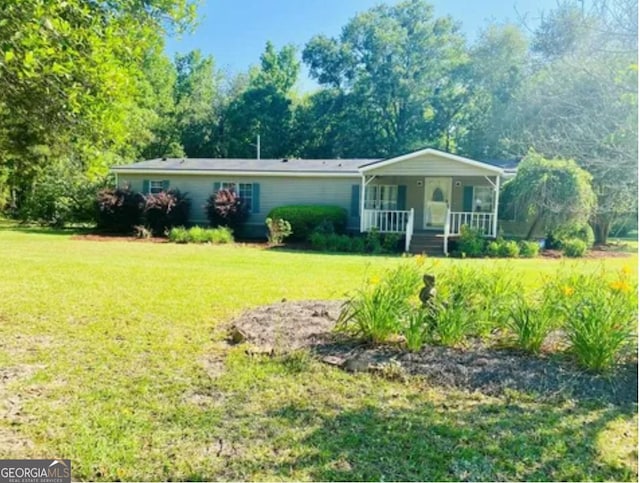 1909 Scotland Rd, Dublin, GA 31021 - single story home featuring covered porch and a front lawn