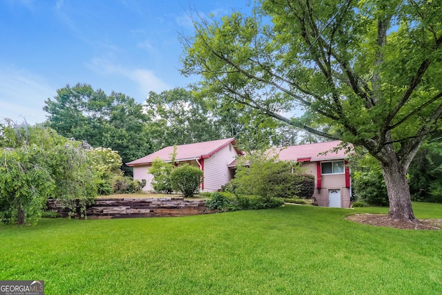 2624 Windridge Dr, Acworth, GA 30102 - view of grassy yard featuring a garage
