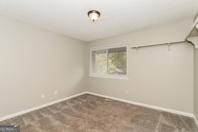 2624 Windridge Dr, Acworth, GA 30102 - empty room with carpet flooring and baseboards