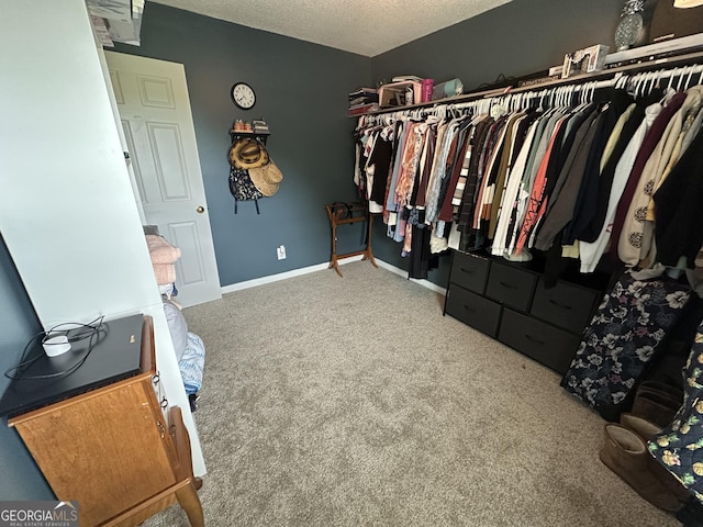 1214 Tucker Rd, Perry, GA 31069 - walk in closet featuring carpet floors
