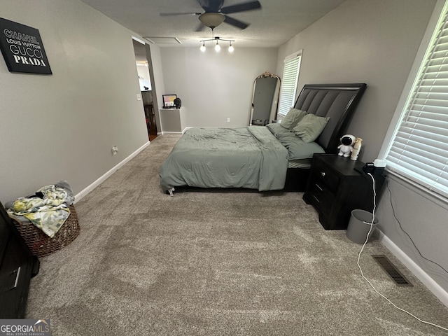 1214 Tucker Rd, Perry, GA 31069 - bedroom featuring carpet flooring, baseboards, and ceiling fan