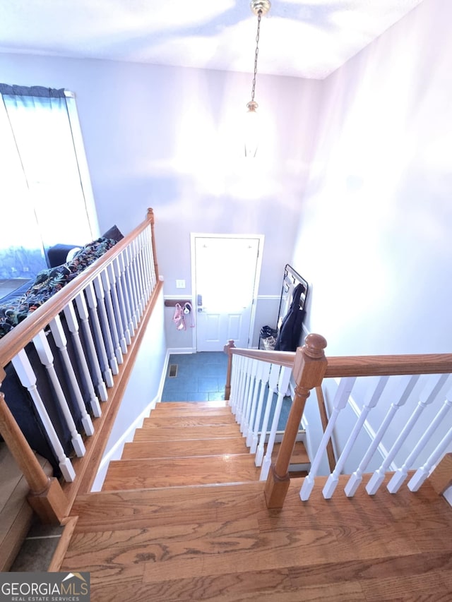 1214 Tucker Rd, Perry, GA 31069 - stairs with wood finished floors and baseboards