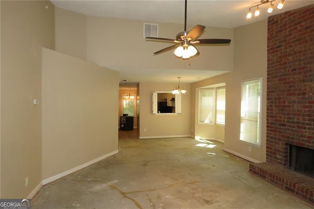 490 Culberson St SW, Atlanta, GA 30310 - unfurnished living room featuring a chandelier, plenty of natural light, a high ceiling, a brick fireplace, and baseboards