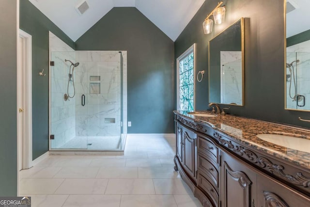 3801 Stonebriar Ln, Duluth, GA 30097 - full bath with a stall shower, double vanity, lofted ceiling, and baseboards