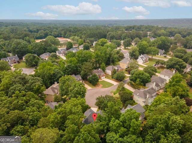 3801 Stonebriar Ln, Duluth, GA 30097 - aerial view of residential area featuring a heavily wooded area