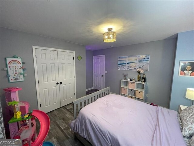 2030 Hydrangea Ln, Austell, GA 30106 - bedroom featuring wood finished floors and a closet