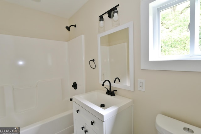 3434 Union Point Rd, Union Point, GA 30669 - full bathroom featuring vanity, toilet, and shower / washtub combination