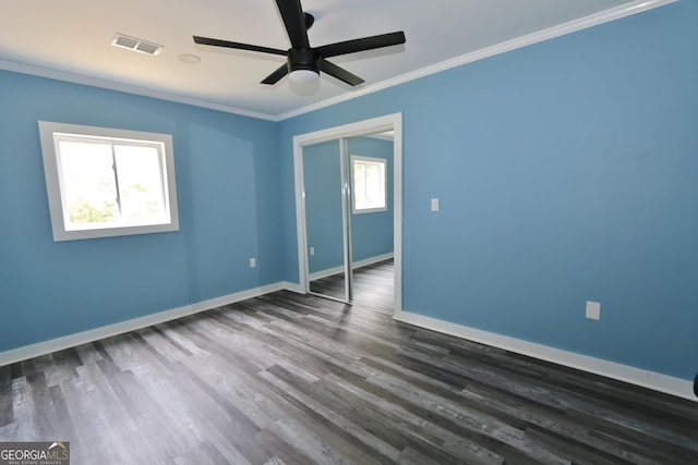 3434 Union Point Rd, Union Point, GA 30669 - unfurnished room with crown molding, ceiling fan, dark wood finished floors, and baseboards