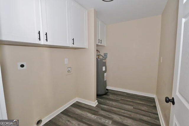 3434 Union Point Rd, Union Point, GA 30669 - laundry area featuring electric dryer hookup, dark wood-style floors, electric water heater, cabinet space, and baseboards