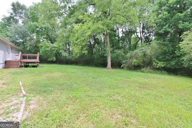 3434 Union Point Rd, Union Point, GA 30669 - view of green lawn with a deck