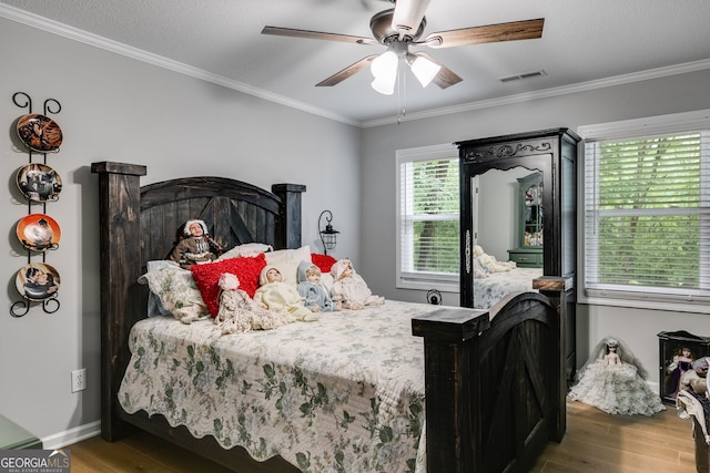212 Teepee Trl, Whitesburg, GA 30185 - bedroom featuring wood finished floors, ornamental molding, and ceiling fan