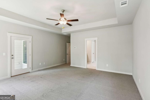 4300 Links Blvd, Jefferson, GA 30549 - carpeted spare room featuring a ceiling fan, a raised ceiling, and baseboards