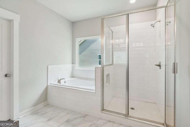 4300 Links Blvd, Jefferson, GA 30549 - full bathroom featuring marble finish flooring, a stall shower, a garden tub, baseboards, and recessed lighting