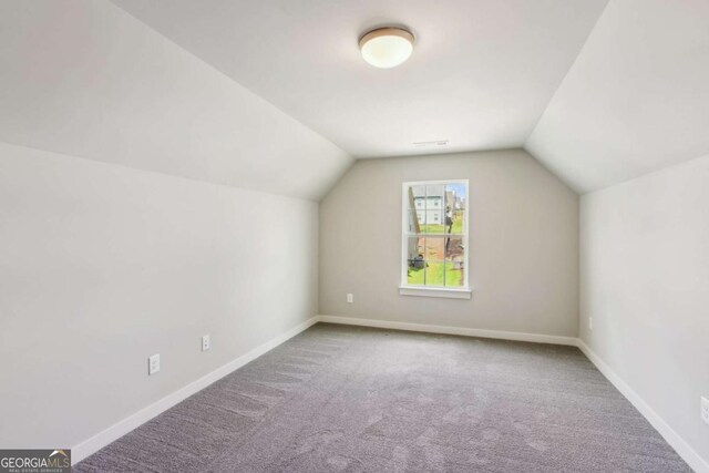 4300 Links Blvd, Jefferson, GA 30549 - additional living space with carpet, lofted ceiling, and baseboards