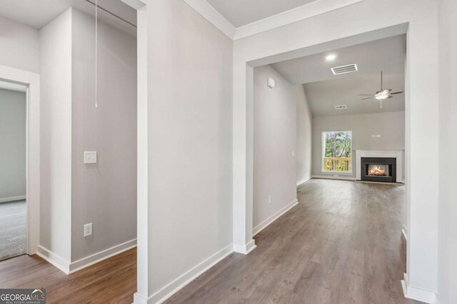 4300 Links Blvd, Jefferson, GA 30549 - hall with wood finished floors, baseboards, and ornamental molding
