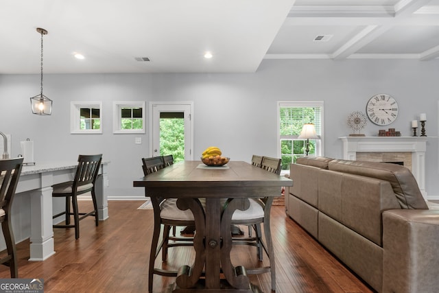 8 Saint Charles Ave, Sharpsburg, GA 30277 - dining room featuring dark wood-style flooring, recessed lighting, a fireplace, beam ceiling, and ornamental molding