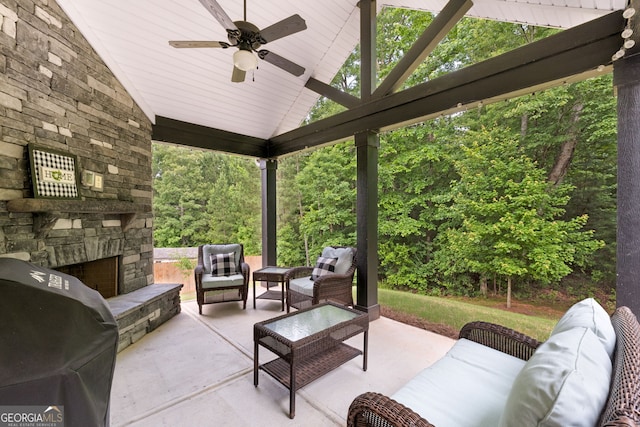 8 Saint Charles Ave, Sharpsburg, GA 30277 - view of patio / terrace featuring an outdoor living space with a fireplace, ceiling fan, and a grill