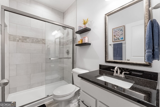 8 Saint Charles Ave, Sharpsburg, GA 30277 - full bathroom with vanity, a shower stall, and toilet