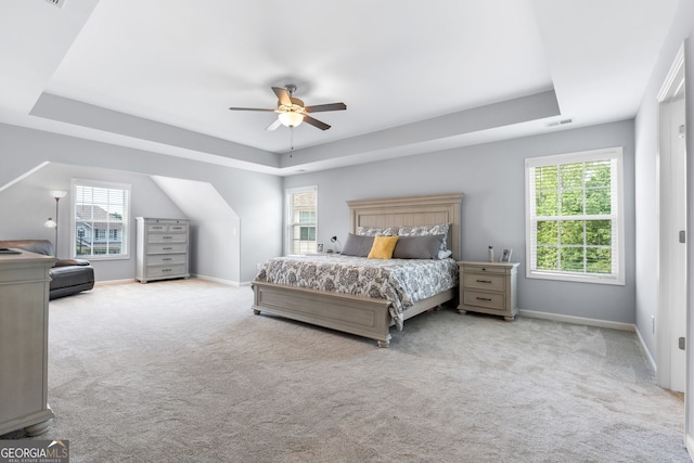 8 Saint Charles Ave, Sharpsburg, GA 30277 - carpeted bedroom with a raised ceiling, baseboards, and ceiling fan