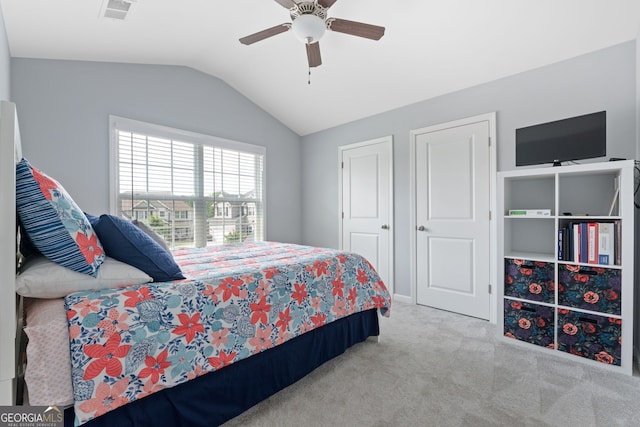 8 Saint Charles Ave, Sharpsburg, GA 30277 - carpeted bedroom with lofted ceiling and ceiling fan