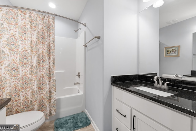 8 Saint Charles Ave, Sharpsburg, GA 30277 - bathroom featuring vanity, toilet, shower / tub combo, and wood finished floors
