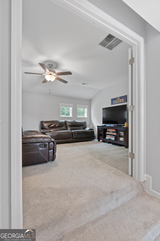 8 Saint Charles Ave, Sharpsburg, GA 30277 - carpeted living area featuring a ceiling fan