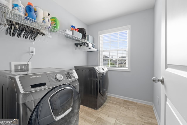 8 Saint Charles Ave, Sharpsburg, GA 30277 - laundry area featuring washing machine and dryer and baseboards
