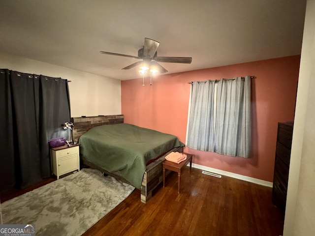 2935 Southshore Dr, Macon, GA 31204 - bedroom featuring wood finished floors, baseboards, and ceiling fan