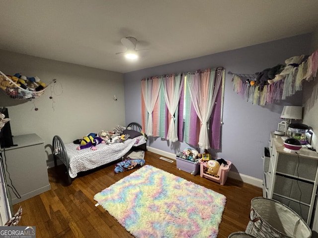 2935 Southshore Dr, Macon, GA 31204 - bedroom with wood finished floors and baseboards