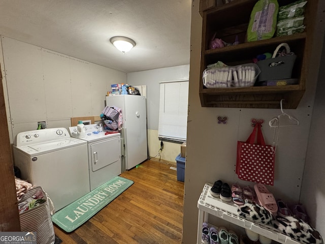 2935 Southshore Dr, Macon, GA 31204 - laundry area featuring light wood-type flooring and washing machine and dryer