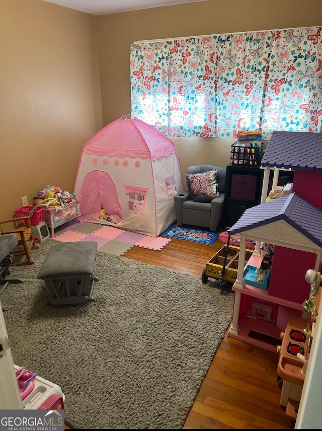 2935 Southshore Dr, Macon, GA 31204 - playroom with wood finished floors and healthy amount of natural light