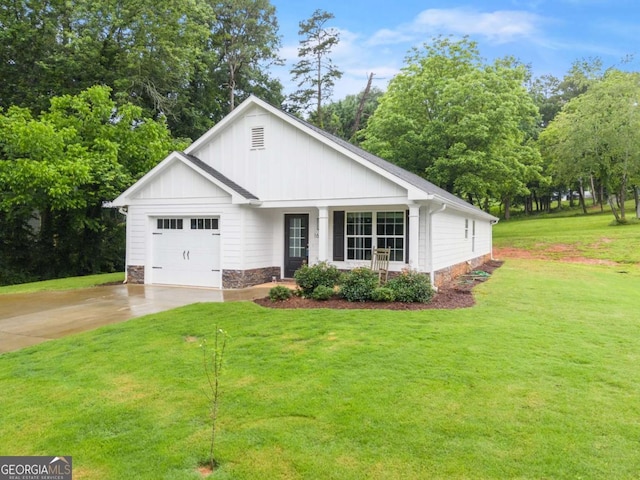 1672 Meadow Lark Ln, Gainesville, GA 30501 - view of front facade featuring board and batten siding, driveway, a front yard, and a garage
